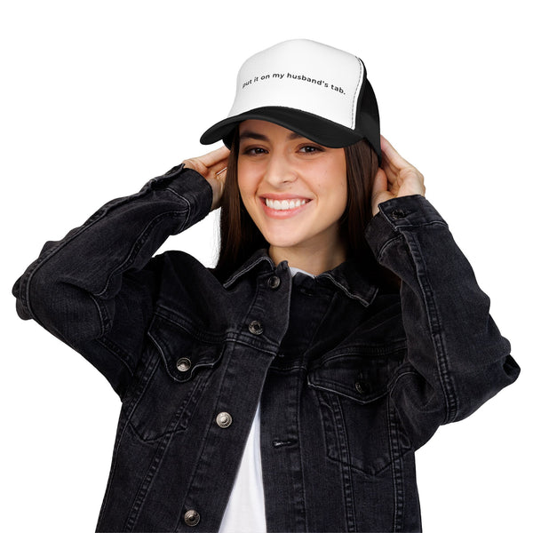 Put It On My Husband's Tab Embroidered Trucker Hat